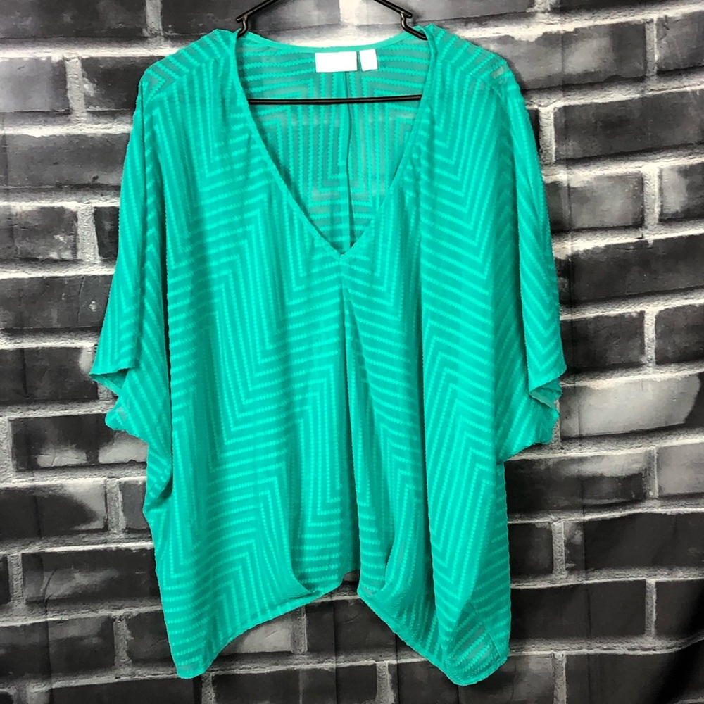 Bisou Bisou sheer top.
